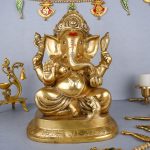 Brass Metal golden colour sitting Ganesha Statue